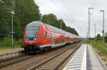 Am Haltepunkt Schwerin Sd fhrt gerade der RE1  Hanse-Express  (RE 4311) von Hamburg Hbf nach Rostock Hbf ein.