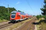 Den Haltepunkt Demker durch fhrt gerade der RE20 (RE 17709) von Uelzen nach Halle(Saale) Hbf.