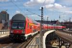 RE1 (RE 18179) von Berlin-Charlottenburg nach Frankfurt(Oder), verlsst hier den Berliner Hbf und gezogen hatte die 114 034-2.