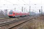 RE13 (RE 17688) von Leipzig Hbf nach Magdeburg Hbf in Magdeburg-Neustadt und geschoben hatte die 112 169-8.