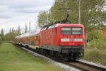 112 114 mit RE 18490 von Berlin Hbf(tief)nach Warnemünde bei der durchfahrt in Rostock-Lichtenhagen.01.05.2018