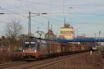 242.516  Ferdinand  pollterte mit einem Schiebewagenzug durch Tostedt am 14.1.12.