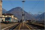 In Domodossola wartet die FS E 646 335 (UIC 91 83 2464 335-5) auf die Abfahrt nach Milano.