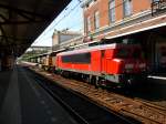 Die verkehrsrot lackierte 1615  Zandvoort  am 02.06.2012 am Haken einer Lok der Baureihe 64 in Dordrecht.