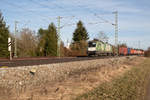 Die mit Werbung von  ÖBB Green Points  ausgestattete 1016 023-4 konnte am 25.02.17 mit einem Containerzug in Richtung München in Eglharting fotografiert werden.