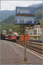 SBB Re 4/4 II 11228 in Faido, an der Gotthard Südrampe.