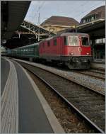 Re 4/4 II 11204 mit einem Extrazug nach Payerne zur Air 14 in Lausanne.