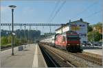 SBB Re 460 094-6  Mobility  mit einem IC in Puidoux-Chexbres.