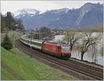 Die SBB Re 460 059-9 mit einem IR kurz nach Villeneuve auf dem Weg Richtung Genève Aéroport.