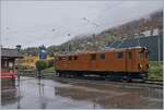 Steht im Regen: die wunderschöne Bernina Bahn Rhb Ge 4/4 81 der Blonay-Chamby Bahn.