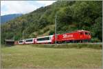 HGe 4/4 104  10 Jahre MGB  mit einem Glacier-Express kurz vor Betten Talstation.