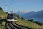 Der CEV MVR ABeh 2/6 7504  Vevey  auf dem Weg nach Montreux mit den Dents de Midi im Hintergrund.