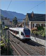 Ein SBB RABE 523 auf dem Weg nach Lausanne kurz nach der Abfahrt in Montreux.