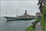 Es herrscht nicht gerade eitel Sonnenschein, als das CGN Raddampfer  La Suisse  Inbetriebsetzung 1910 als Kurssschiff 900 die Anlegestelle Château de Chillon verlässt.