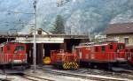 HGe 4/4 I 32 und 33 und eine Diesellok der FO im Depot Brig (Juli 1983)