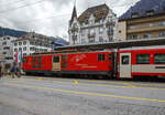 Der Gepäcktriebwagen Deh 4/4 II - 96  Münster   der Matterhorn-Gotthard-Bahn (MGB), ex FO 96  Münster   (Furka-Oberalp-Bahn), am 25.05.2023 mit einen Regionalzug von Andermatt nach Visp