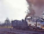 Sursee Triengen Bahn (Regelbetrieb): Der Rauch hüllt die Landschaft in einen diesigen bräunlichen Nebel.