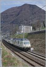 Die SBB Re 460 041-7  coop  mit einem IR90 von Genève Aéroprt nach Brig bei Villeneuve.