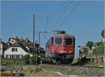Hier nochmals die SBB Re 6/6 11669 (Re 620 069-5 )  Hägendorf  mit etwas mehr Umfeld als Lokzug zwischen Ligerz und Twann auf der Fahrt in Richtung Biel/Bienne. 

11. Juli 2025