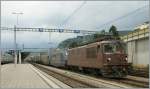 BLS Re 4/4 N 171 in Vielfachsteuerung mit zwei Re 465 mit einem Gterzug in Spiez am 29.06.2011.