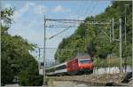 SBB Re 460 058-5 mit einem IR beim Château de Chillon.