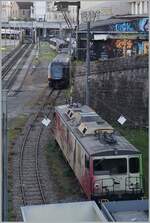 Ein Blick in den  Hinterhof  der MOB mit der abgestellten GDe 4/4 6006 (ex GMF/TPF) und einen GEX. 

29. April 2025