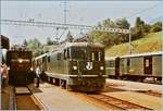 RhB Ge 6/6 I 412 mit ihrem Güterzug wartet in Filisur an der Rampe, währen die Ge 4/4 II 617 mit ihrem Albula-Schnellzug nach St. Moritz eintrifft, im Hintergrund der Anschlusszug von und nach Davos. 


20. August 1984 
