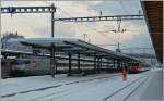 Klein und Gross in Interlaken Ost: SBB Re 460 und Brnigbahn De 4/4.