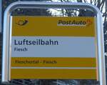 (214'134) - PostAuto-Haltestellenschild - Fiesch, Luftseilbahn - am 9. Februar 2020