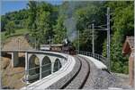 Die SEG G 2x2/2 105 der Blonay Chamby Bahn mit ihrem Dampfzug auf dem Weg von Blonay nach Chamby und fährt über den nun frisch sanierten Baye de Clarens Viaduktes.
