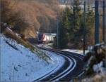 RABe 502 203-8 verschwindet ebensoschnell wie er gekommen war...