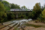 An der Nebenlinie (Weinfelden-) Sulgen - Gossau (-St.Gallen) (St.Galler S-Bahn S5): Zwei Thurbo GTW 2/6 (730 und 708) auf der Brücke von Sitterdorf.