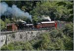 50 Jahre Blonay Chamby - MEGA BERNINA FESTIVAL: Trotz fehlendem Schnee eindrücklich: die RhB Dampfschneeschleuder X rot d 9214 (1052) mit der BFD HG 3/4 bei Vers-chez-Robert.