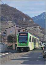 Aus der Gegenrichtung hat der TPC ASD ABe 4/8 471 der Fahrt als R71 von Aigle nach Les Diablerets den Halt Aigle Marché verlassen und färht nun unter den alten Fahrleitungsmasten in Richtung Les Diablerets. 

9.Februar 2026