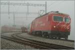 Oberalppass mit Galcier-Express, MGB Regionalzügen und Nebel.