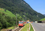 Zentralbahn, Strecke Luzern - Engelberg: Lok HGe4/4 101 967 am Schluss eines Zuges aus Engelberg, Niederrickenbach, 12.August 2024 