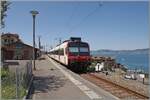 Der Region Alpes Regionalzug R91 6125 wartet in Saint Gingolph auf die Abfahrt (15:51) nach Brig (an 17:56). Im Einsatz f�r diese Leistung ist ein SBB Domino mit dem ABt NPZ Do 50 85 39-43 814-5 CH-SBB an der Spitze, dem B NPZ Do 50 85 29-43 150-6 CH-SBB als Zwischenwagen und dem schiebenden RABe 560 217 (UIC RABe 560 DO 94 85 7 560 217-2 CH-SBB) am Zugschluss. 22. Juli 2026 