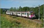 Der etawas arg mit Werbung beklebt ex MThB ABDe 538 316-1  bei der Travys im Vallée de Joux kurz nach Le Pont auf der Fahrt nach Vallorbe.