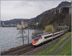 Ein SBB RABe 503 / ETR 610 als EC 39 auf seiner Fahrt von Genève nach Milano beim Château de Chillon.