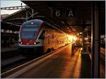 Der SBB RABe 511 bereichert den Sonnenuntergang in Lausanne.