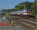 511 114 auf dem Weg Richtung Lausanne bei der Durchfahrt in Mies.