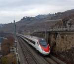 Ein SBB ETR 610 (Pinocchio) Genf–Lausanne-Mailand am 25.02.2012 bei St Saphorin.