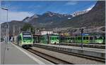 In Aigle warte TPC Züge auf die Abfahrt: Der Beh 2/6 542 in Richtung Monthey, der ASD BDe 4/4 402 mit Bt in Richtung Les Diablerets und ein AL Zug nach Leysin, von welchem hier nur die