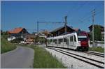 Der TPF SURF ABe 2/4 - B - Be 2/4 101 nach Palézieux wartet in Vaulruz Sud auf den Gegenzug.