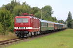 243 005-6 mit Leerzug von Warnemünde nach Rostock-Bramow bei der Durchfahrt in Rostock-Lichtenhagen.